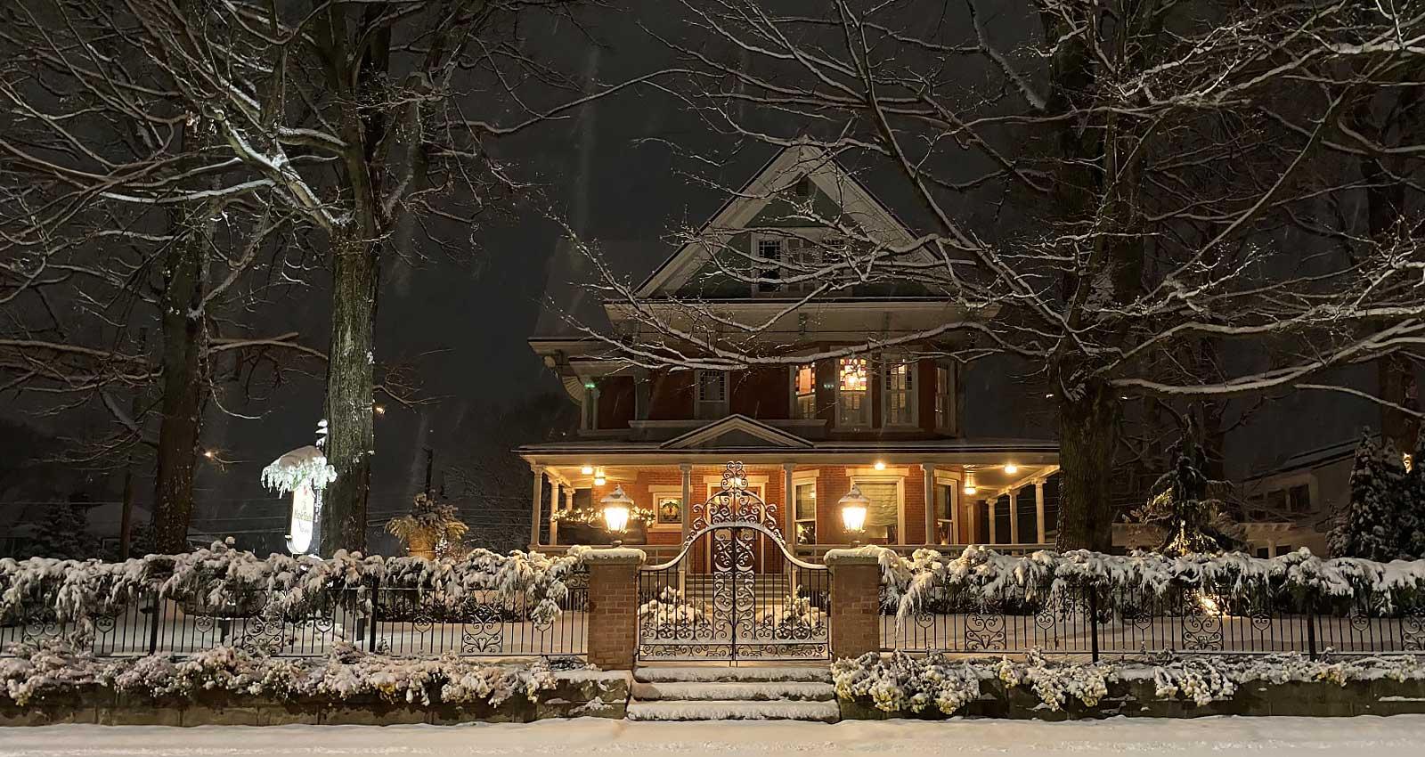 Exterior of inn covered with snow